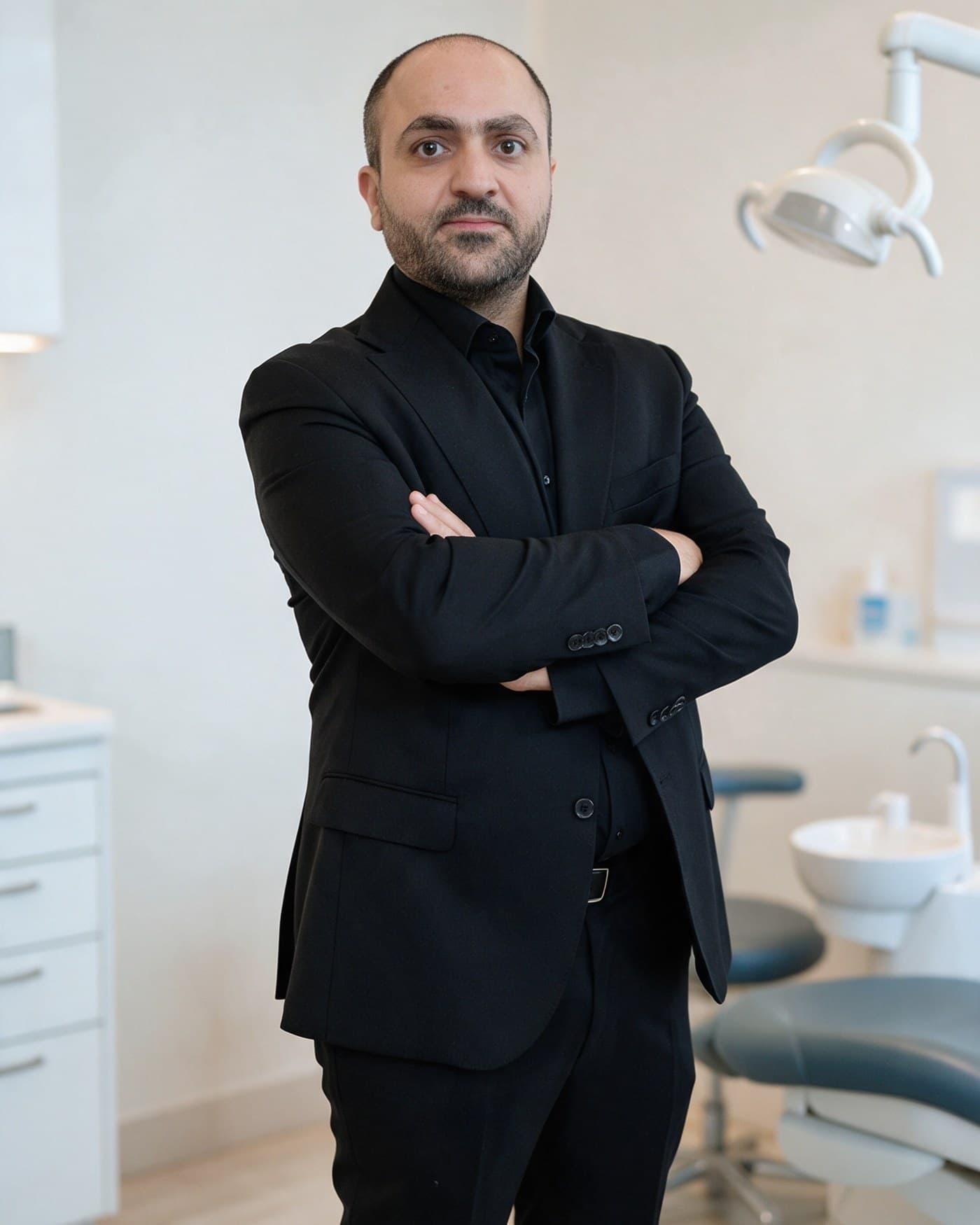 Dr. Fersan Marei, general dentist, in a dental operatory