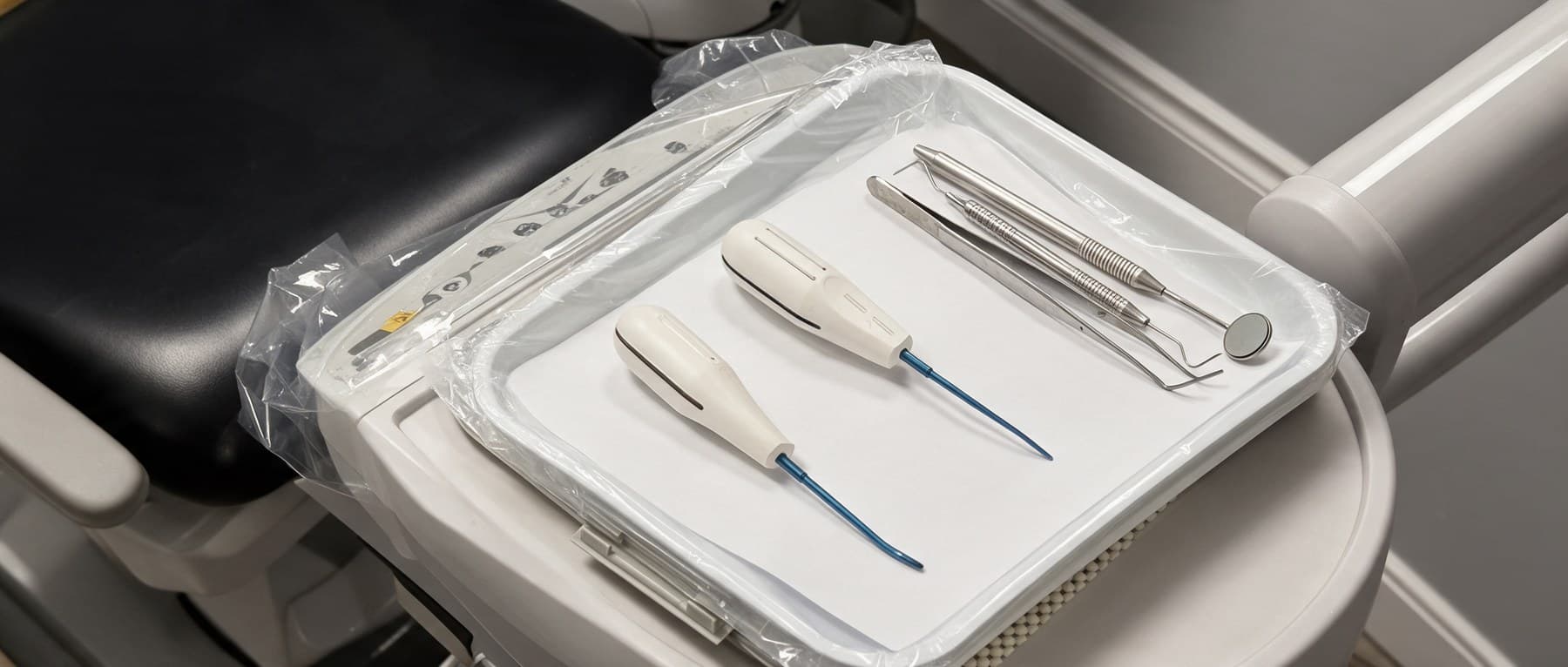 A surgical tray laid out beside the chair before a case